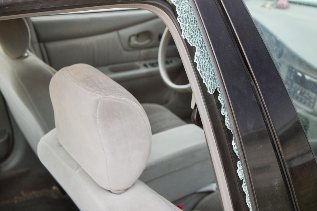 Picture of broken car window in Corona CA